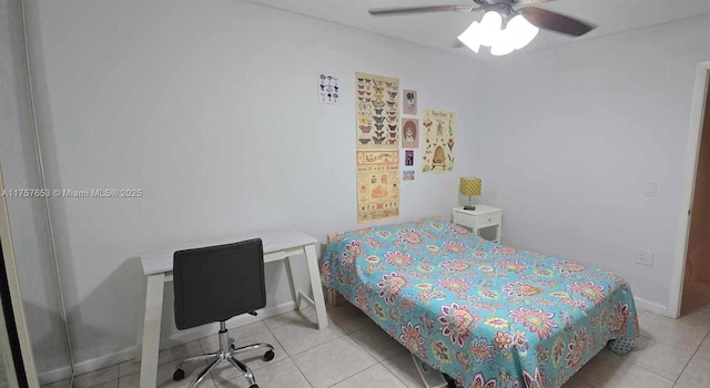 bedroom with tile patterned floors, baseboards, and ceiling fan