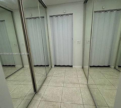 bathroom featuring tile patterned flooring