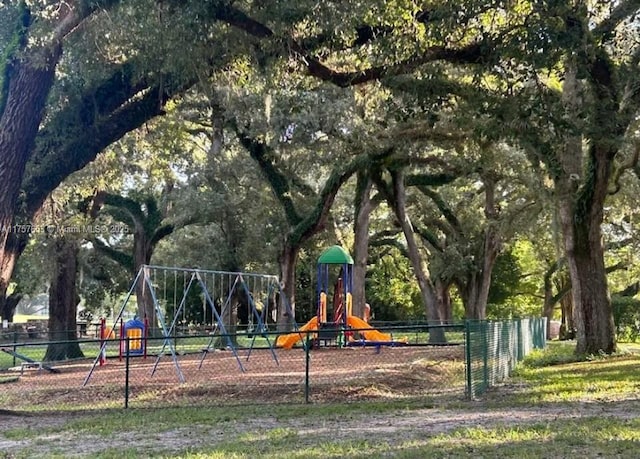 community play area featuring fence