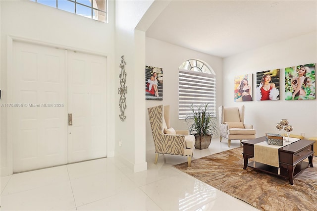 living area with tile patterned flooring