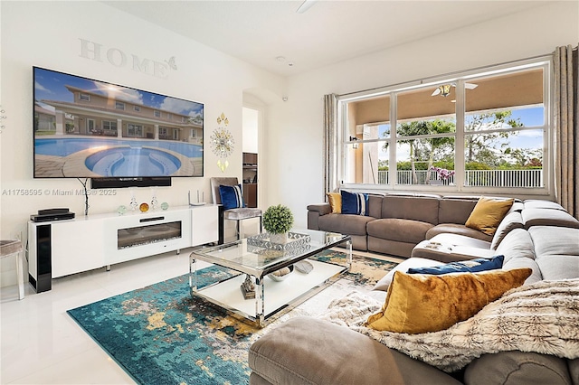 living area featuring tile patterned floors