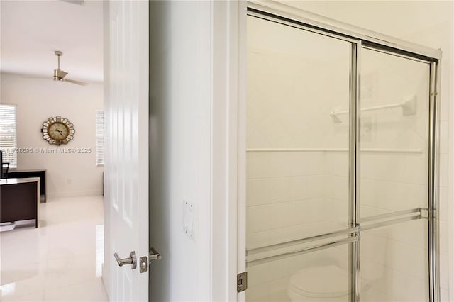 bathroom featuring tiled shower