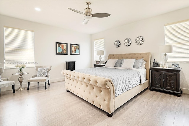 bedroom with light wood-type flooring, ceiling fan, baseboards, and recessed lighting