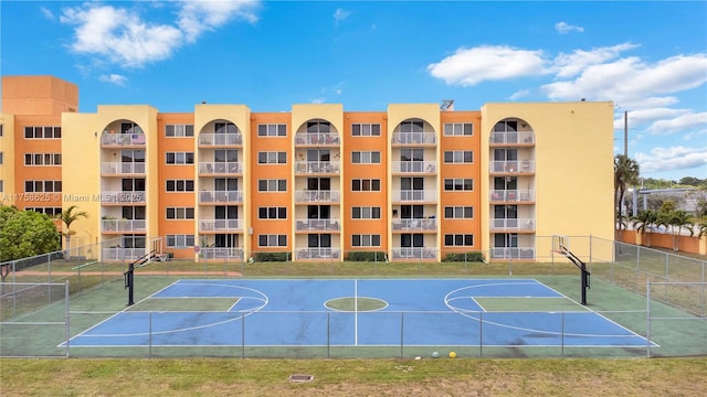 view of sport court with community basketball court and fence