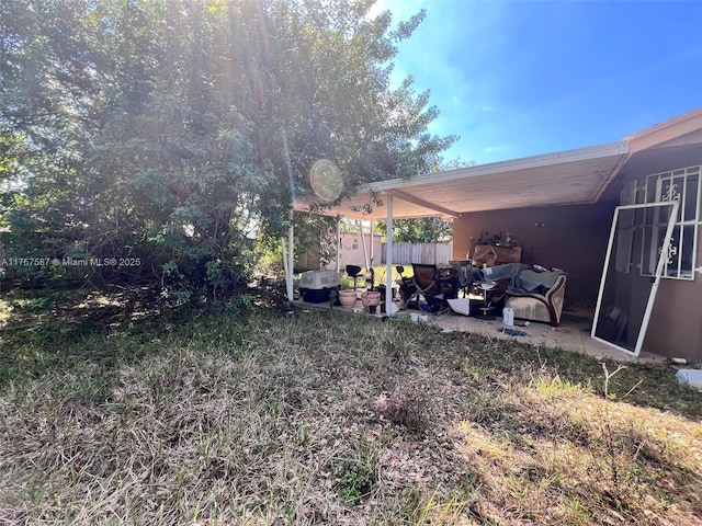 view of yard with fence