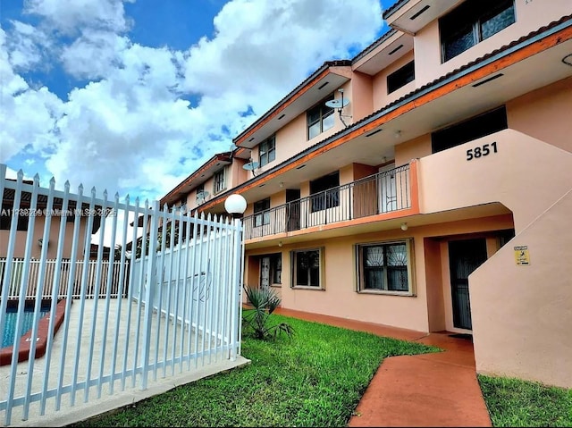 view of property featuring fence