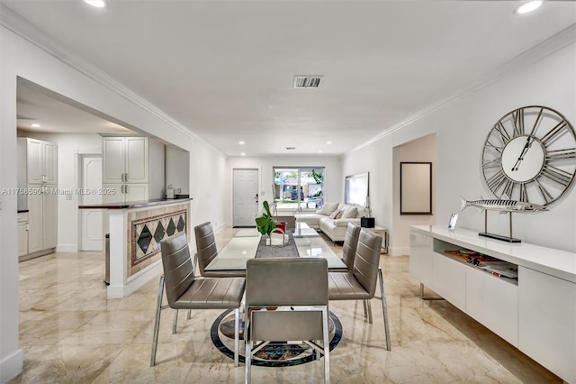 814 NE 4th St, Hallandale Beach, FL 33009 - dining space with crown molding, visible vents, recessed lighting, and marble finish floor