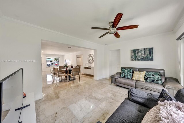 814 NE 4th St, Hallandale Beach, FL 33009 - living room with marble finish floor, ceiling fan, baseboards, and ornamental molding