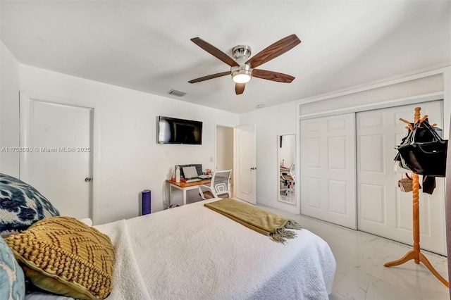 814 NE 4th St, Hallandale Beach, FL 33009 - bedroom with a closet, visible vents, marble finish floor, and ceiling fan