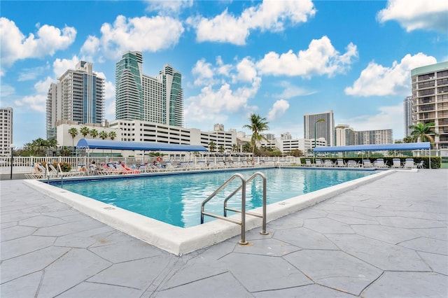 pool featuring a view of city