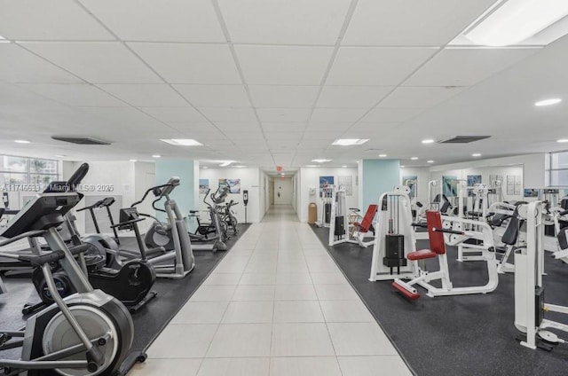 workout area featuring a drop ceiling