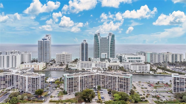 property's view of city featuring a water view