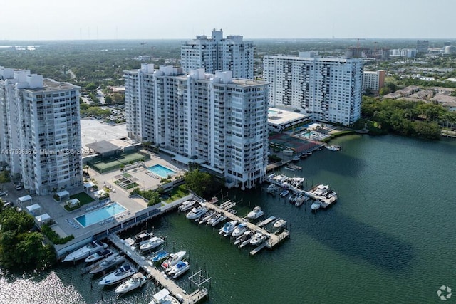 bird's eye view with a view of city and a water view