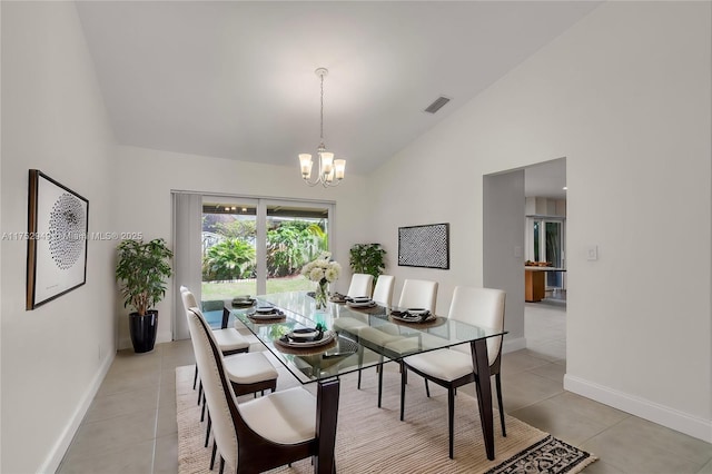 dining space featuring light tile patterned floors, baseboards, visible vents, high vaulted ceiling, and a notable chandelier