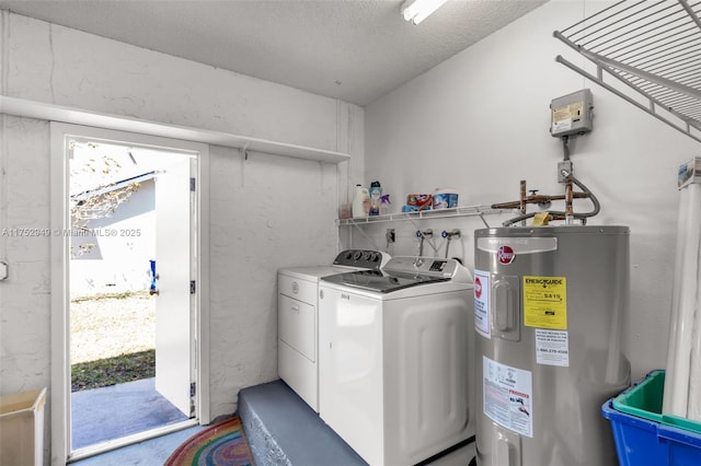 laundry room featuring laundry area, washer and dryer, electric water heater, and a healthy amount of sunlight