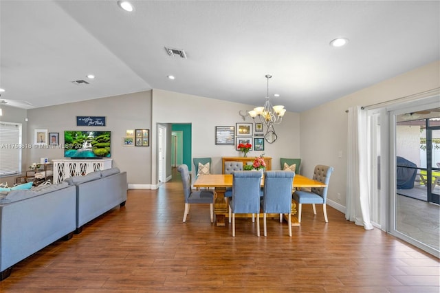 dining room with lofted ceiling, recessed lighting, wood finished floors, visible vents, and baseboards