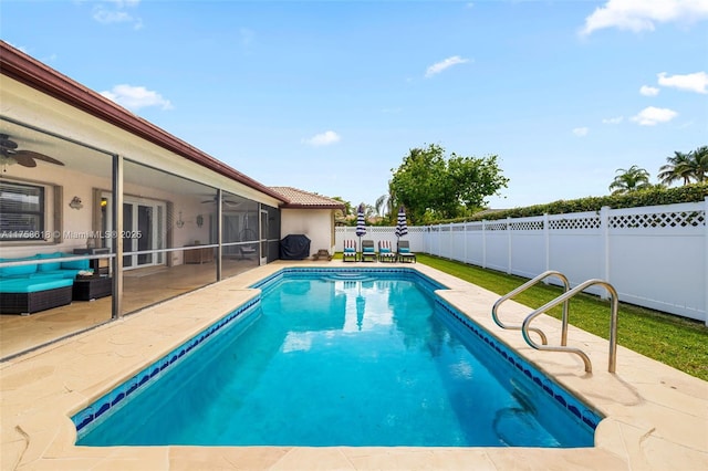 view of pool featuring a patio area, ceiling fan, a fenced backyard, and french doors