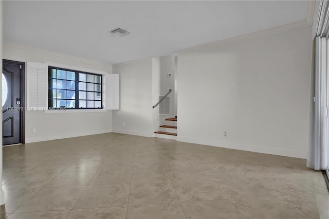 interior space featuring visible vents, crown molding, and stairway