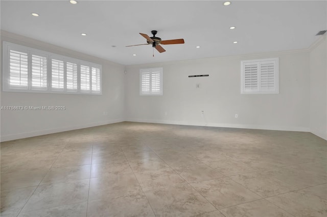 spare room with ornamental molding, recessed lighting, visible vents, and baseboards