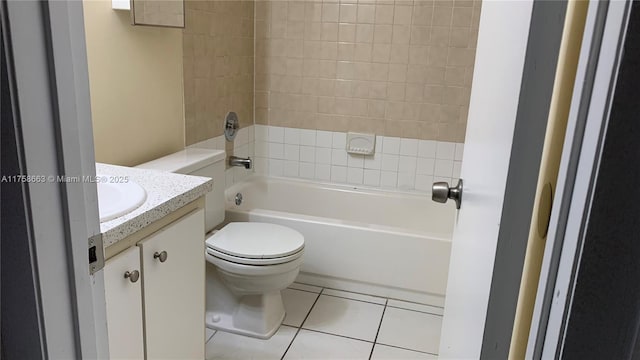 bathroom with vanity, shower / washtub combination, tile patterned flooring, and toilet