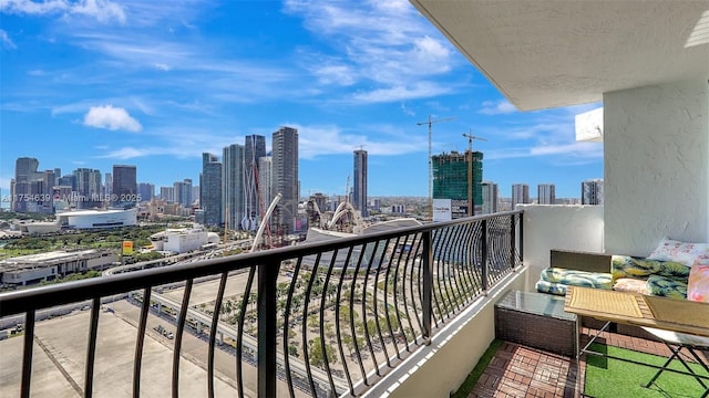 balcony featuring a view of city