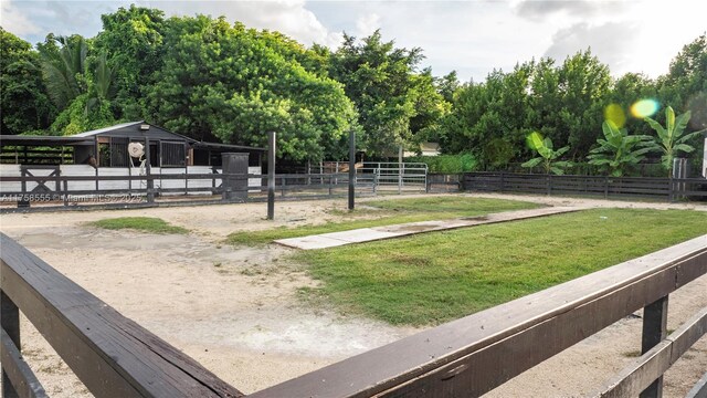 view of yard with an outbuilding and an exterior structure