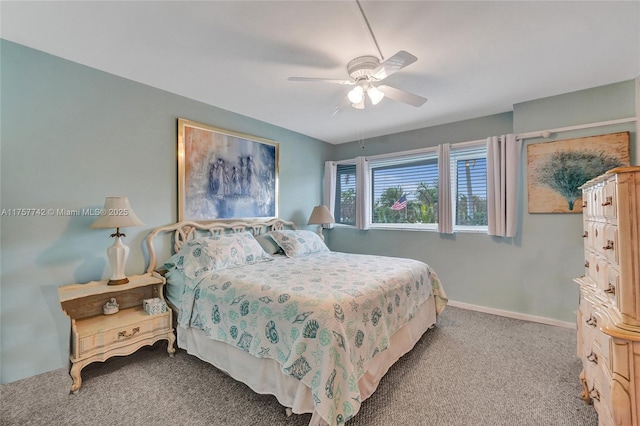 bedroom with carpet floors, ceiling fan, and baseboards