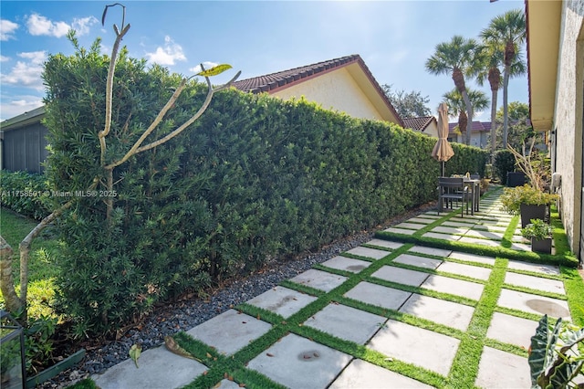 view of yard featuring a patio area and fence private yard