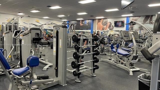 workout area featuring a drop ceiling