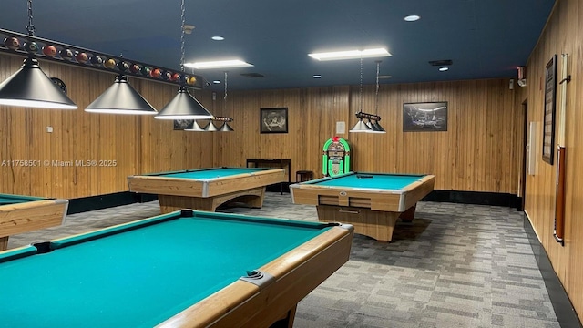 recreation room featuring carpet, wood walls, and pool table