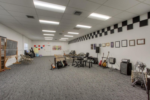 miscellaneous room with carpet flooring, visible vents, and a drop ceiling