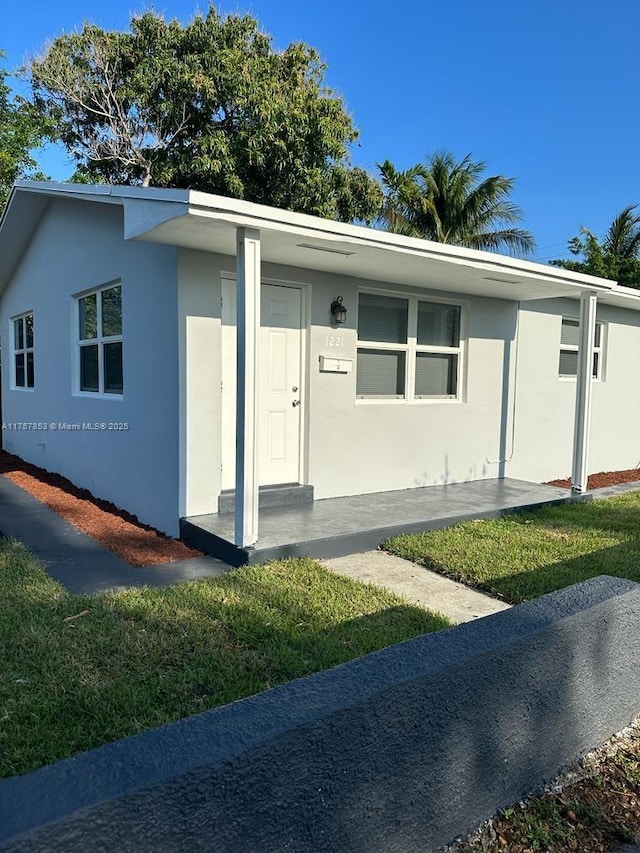 view of front of house with stucco siding