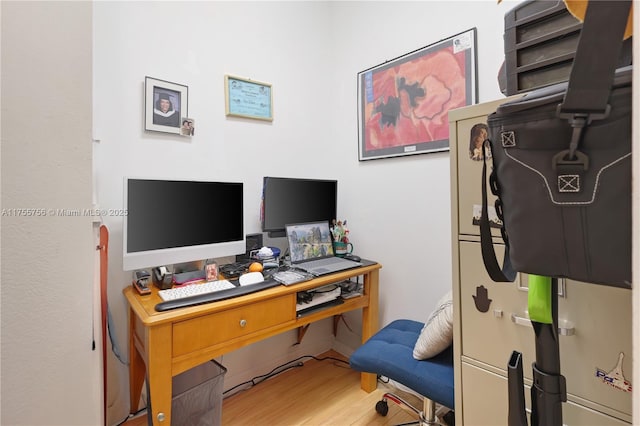 office space with wood finished floors