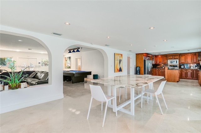 dining area with arched walkways, billiards, visible vents, and recessed lighting