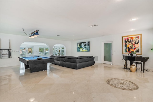 playroom with arched walkways, pool table, visible vents, and baseboards