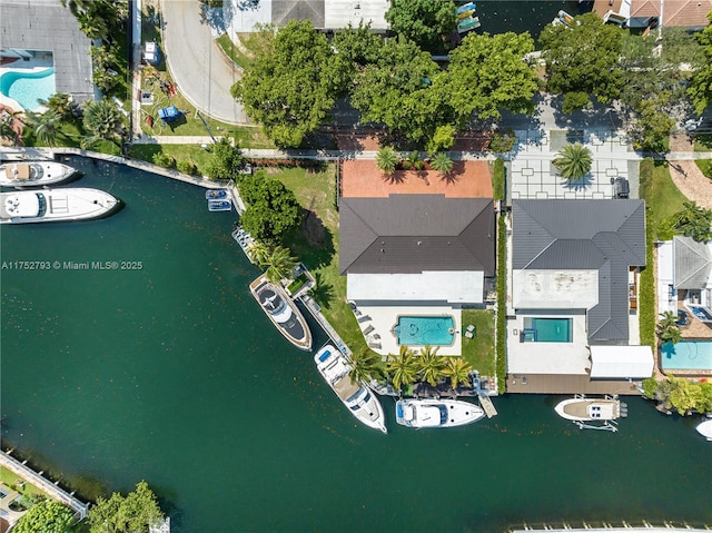 birds eye view of property featuring a water view