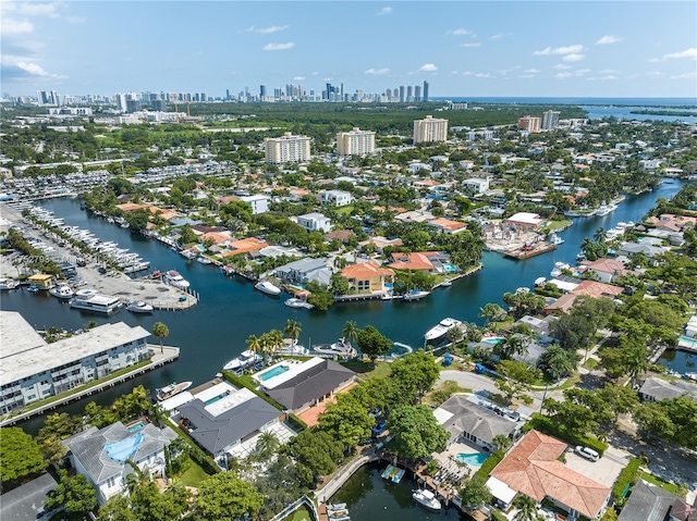 bird's eye view with a water view and a city view