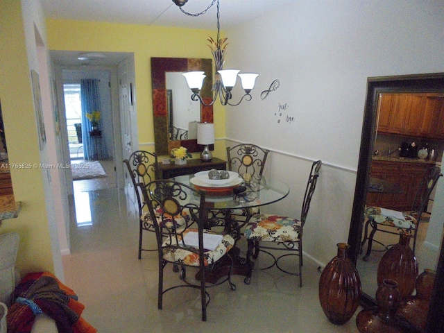 dining room featuring a notable chandelier