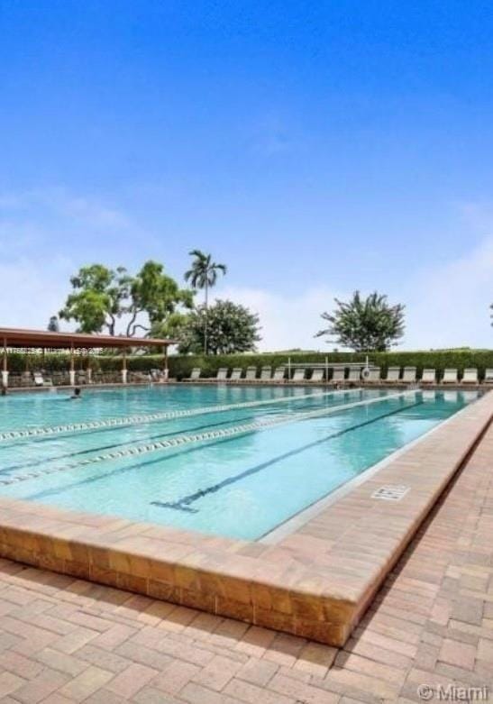 pool with a patio