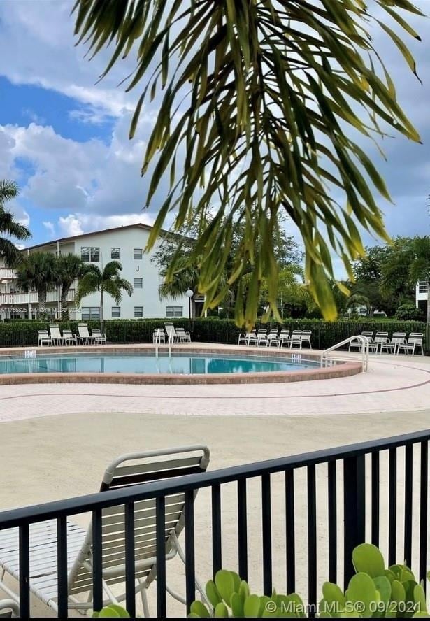 pool featuring fence