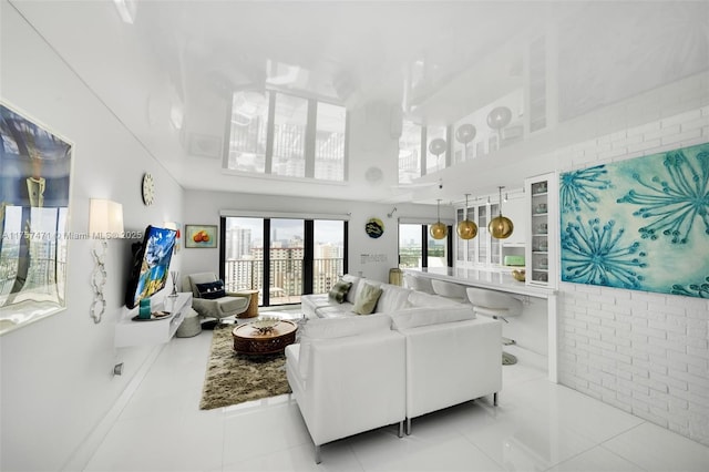 living area featuring tile patterned floors