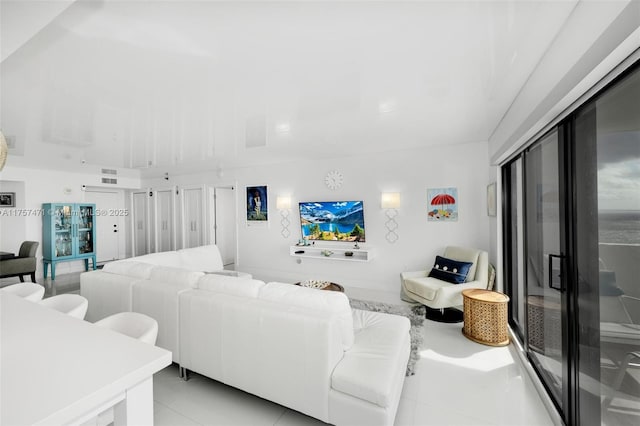 living room featuring light tile patterned flooring