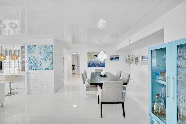 dining area featuring tile patterned floors