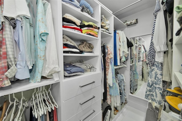 walk in closet featuring tile patterned floors