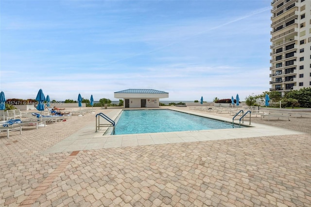 pool featuring a patio