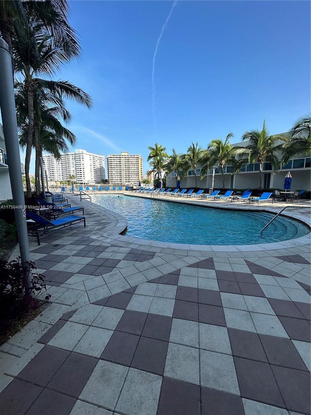 pool featuring a patio area