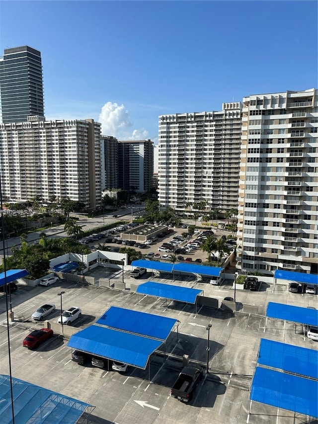 view of swimming pool with a view of city