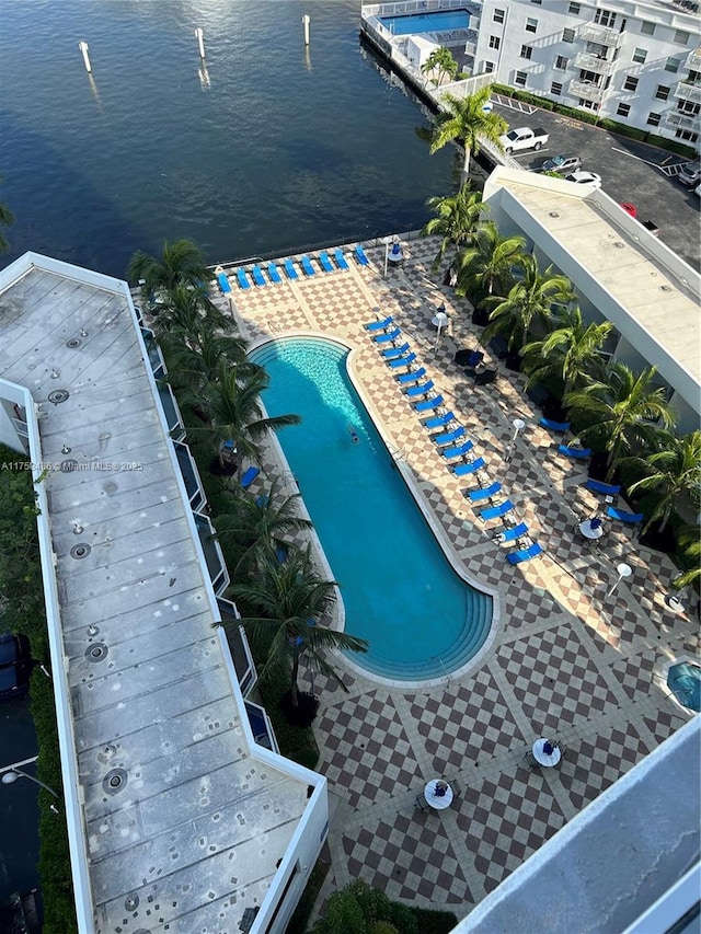 birds eye view of property with a water view