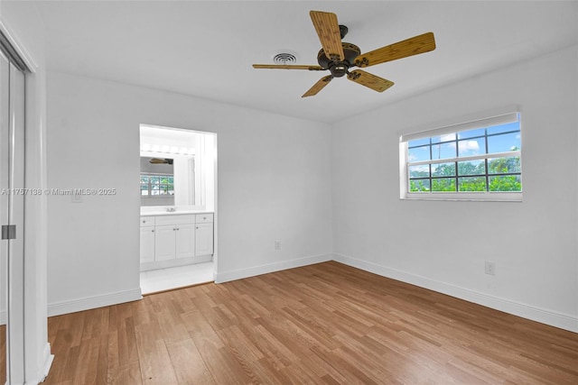 8790 SW 84th St, Miami, FL 33173 - unfurnished bedroom featuring a closet, visible vents, ensuite bath, light wood-type flooring, and baseboards