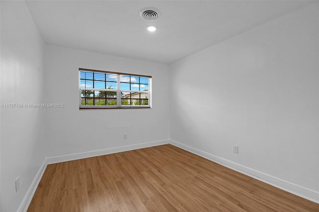 8790 SW 84th St, Miami, FL 33173 - spare room featuring light wood-type flooring, visible vents, and baseboards